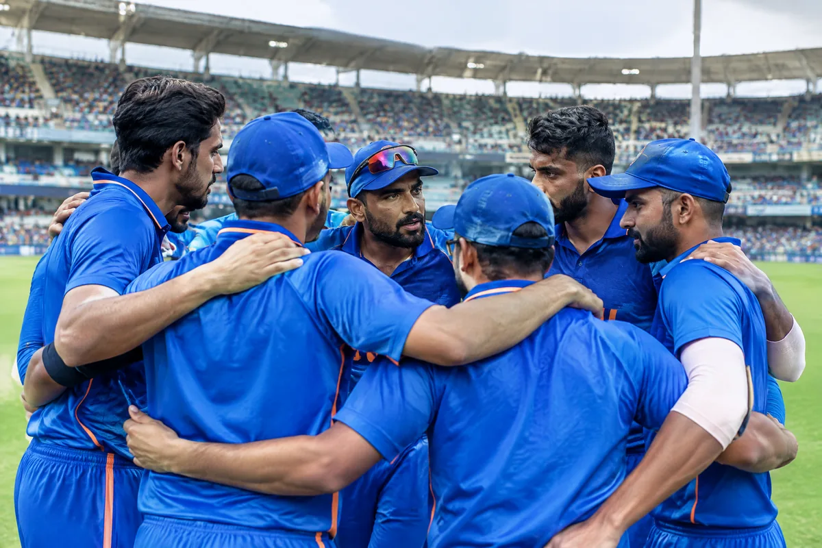 Cricket players discussing their powerplay plan